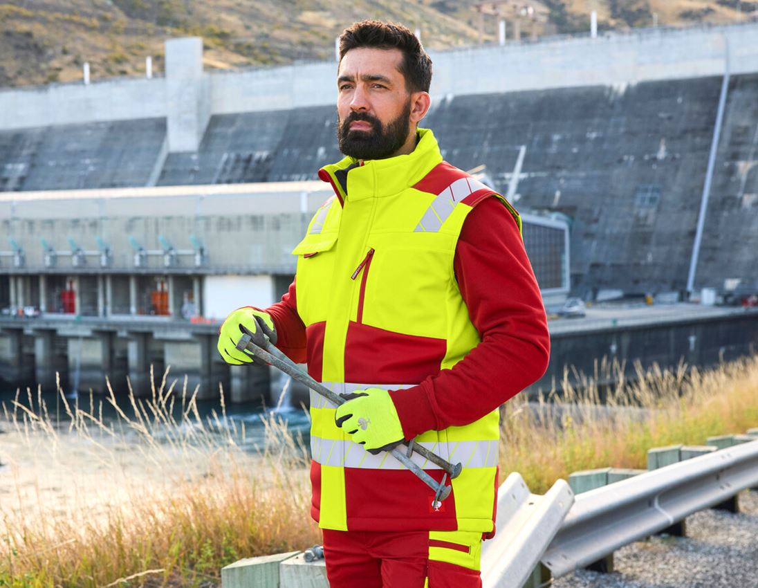 Westen: Warnschutz Winter Softshellweste e.s.motion 24/7 + rot/warngelb