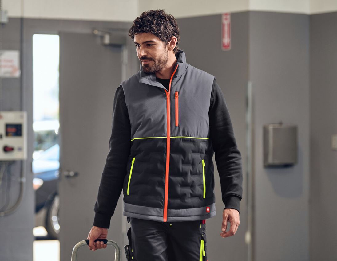 Kleding: e.s. Padded-bodywarmer + antraciet/zwart/signaaloranje/signaalgeel