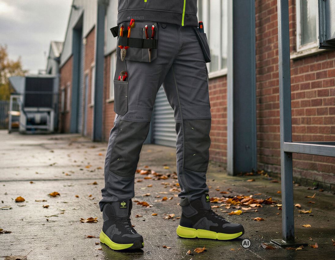 AI-gegenereerd / bewerkt - Werkbroeken: Stretch holster werkbroek e.s.line.core + carbongrijs/signaalgeel