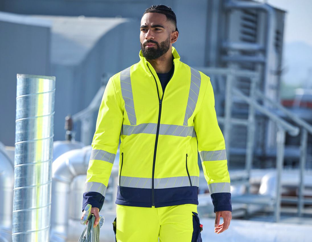 Arbeitsjacken: Warnschutz Softshelljacke e.s.line.core + warngelb/dunkelblau