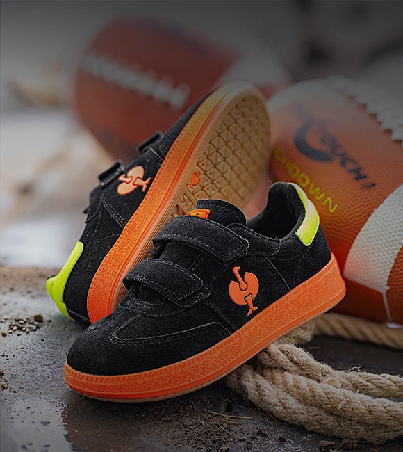 Chaussures polyvalentes Strauss.0900 low pour enfants en noir/jaune de signalisation/orange de signalisation