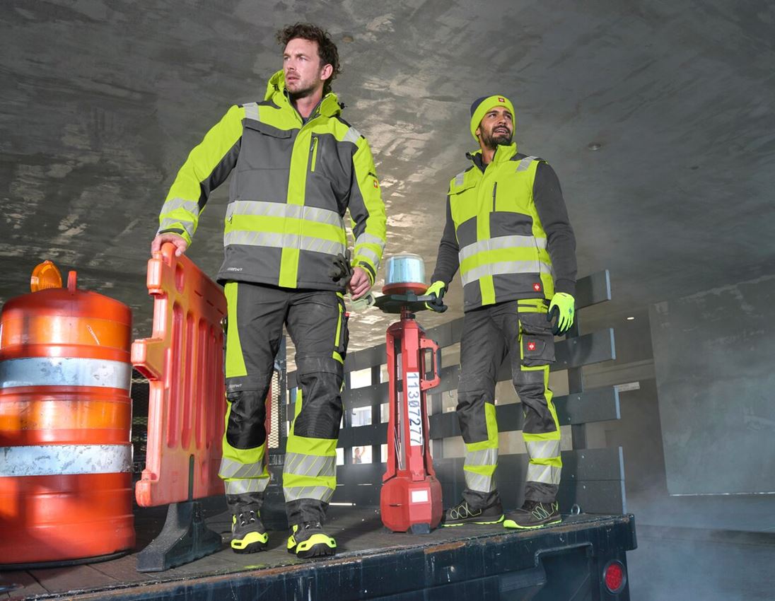 Westen: Warnschutz Winter Softshellweste e.s.motion 24/7 + anthrazit/warngelb 5