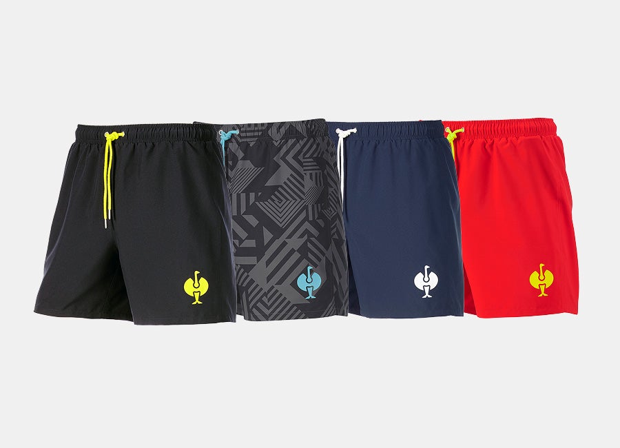 Mann und Kind tragen Badeshorts e.s.trail.
