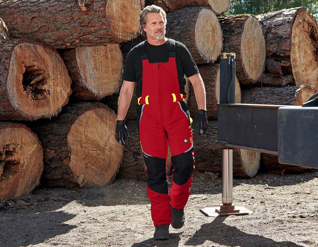 Pantalons de travail: e.s. Salopette de forestier anticoupure, KWF + rouge/jaune fluo
