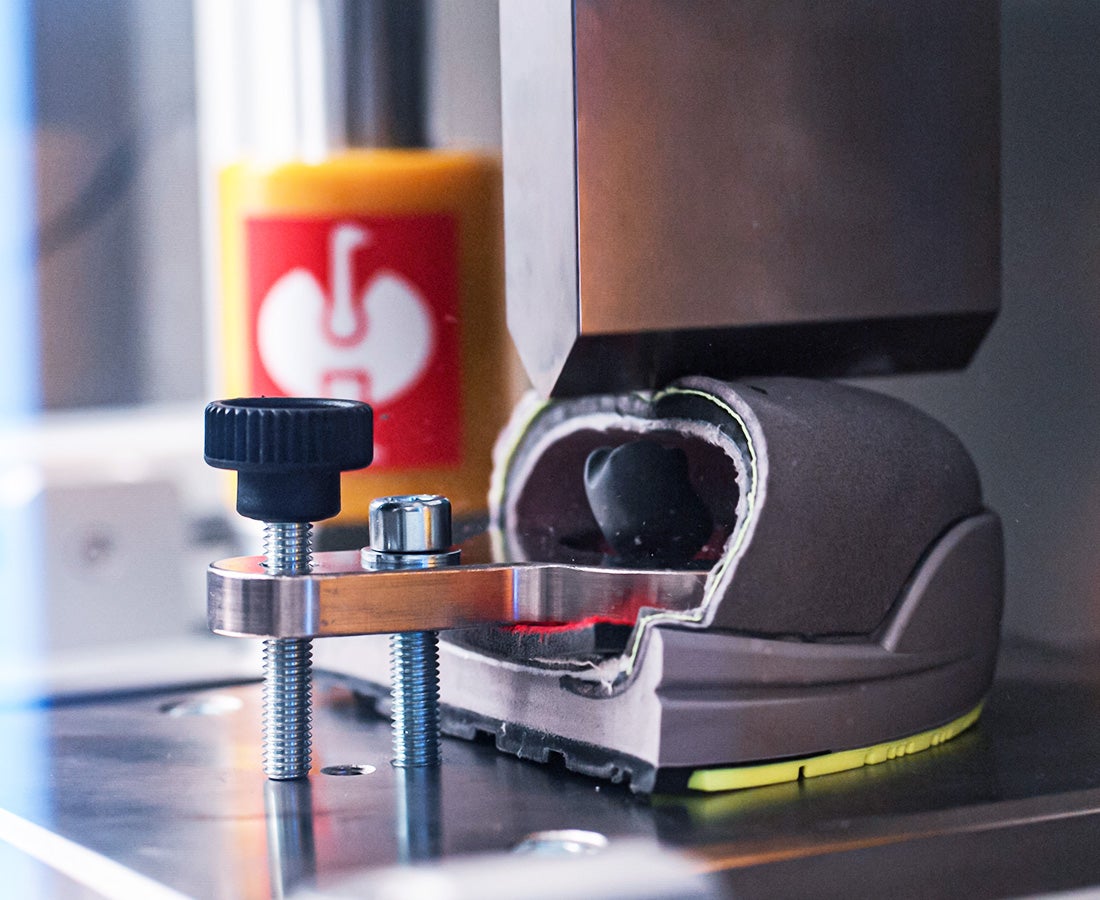 Man in footwear test lab