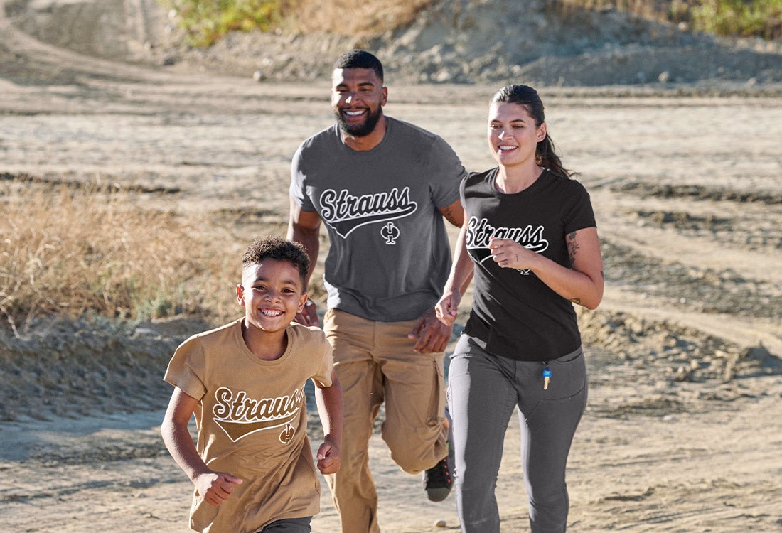Man, woman and child in matching outfits with the new e.s.e:pic shirts.