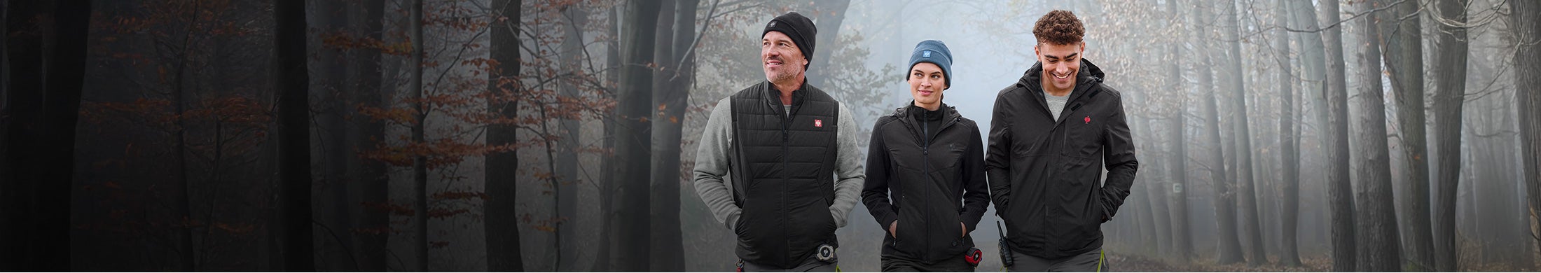 Two men and one woman wearing heated products from Strauss