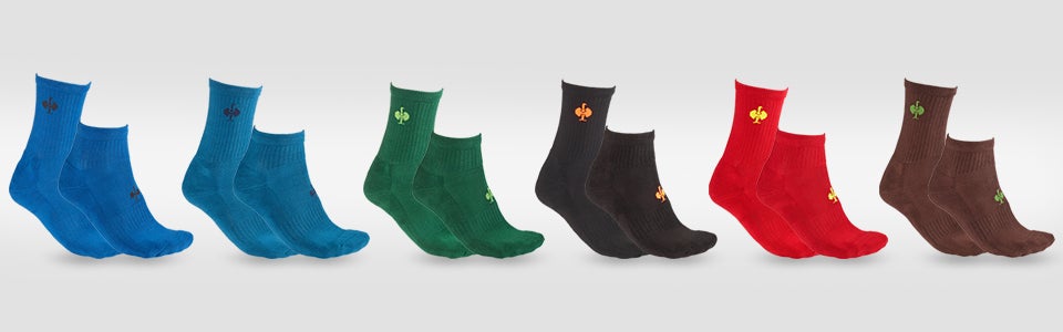 View of various colored all-round socks, arranged side by side.