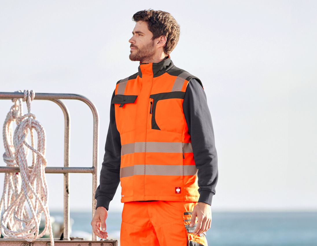 Baumaschinenführer: Warnschutz-Softshell-Weste e.s.motion + warnorange/anthrazit