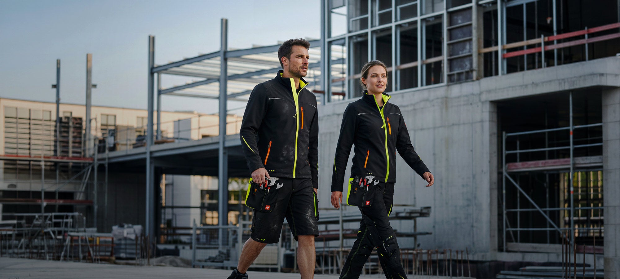 A man and a woman are wearing the e.s.motion2020 collection from Strauss.