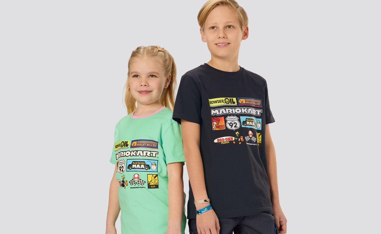 Boys and girls wearing the new MarioKart T-shirts