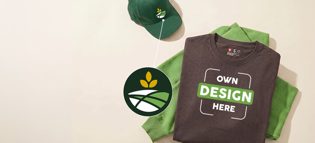 AI-generated / modified – Folded dark brown T-shirt with print on a green hoodie and green cap with a plant logo.
