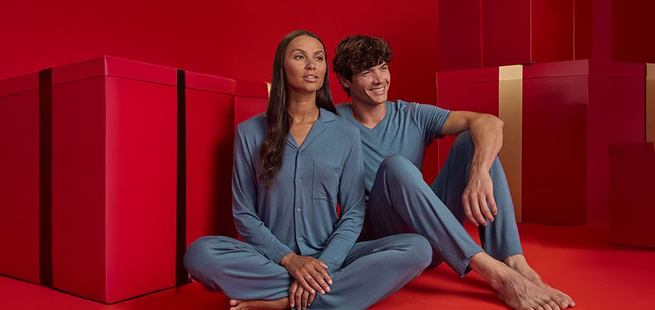 Man and woman in the new Strauss Christmas collection