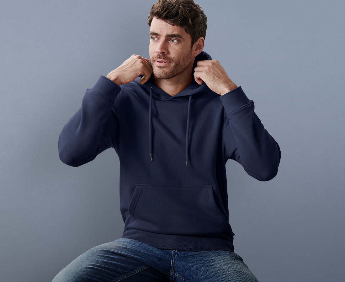 Man in a dark blue hoody.