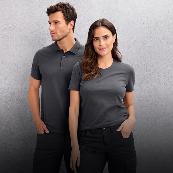 Mann und Frau in den neuen e.s.basics Shirts
