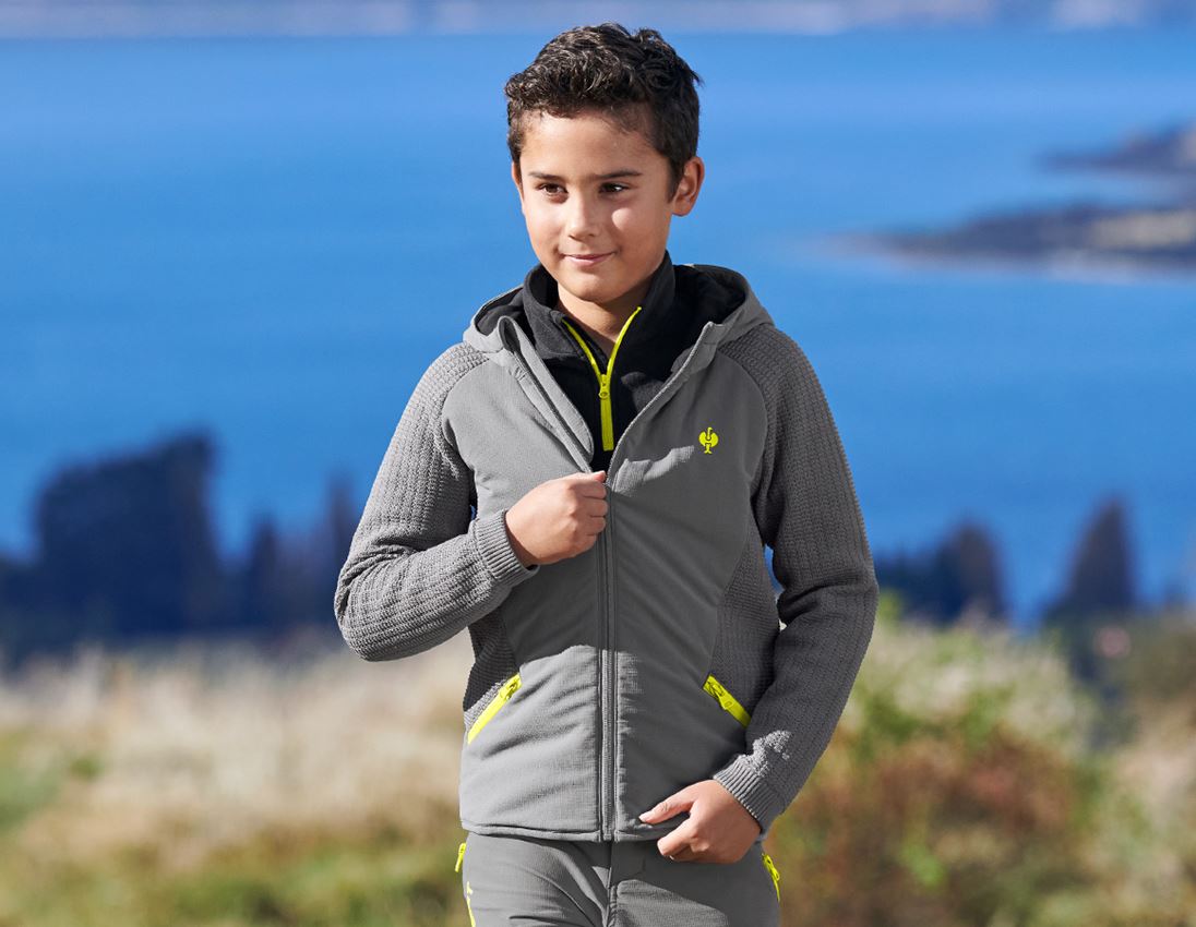 Jassen: Hybride gebreide jack met capuchon e.s.trail,kind. + bazaltgrijs/zuurgeel