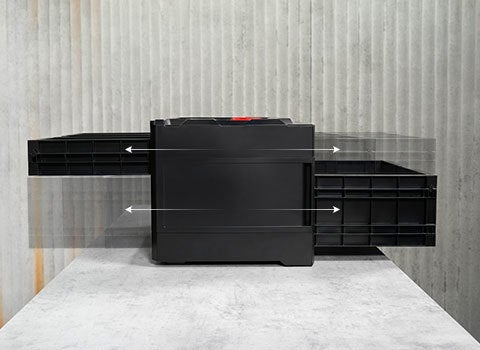 STRAUSSboxx 265 Rack against a grey studio background, drawers open on both sides