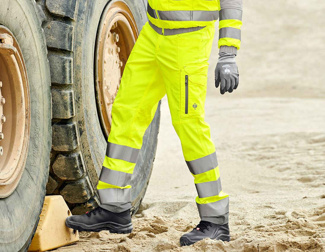 Témy: Výstražné cargo nohavice e.s.concrete + výstražná žltá/perlová sivá
