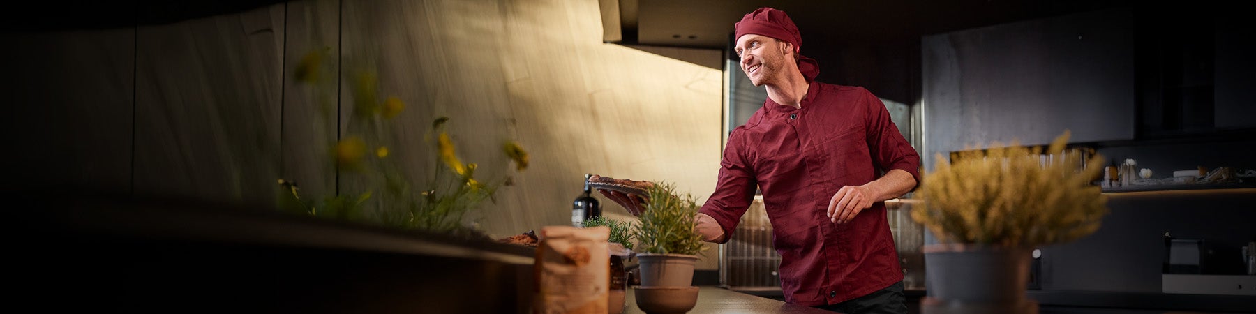 Man wearing chef's clothing by Strauss